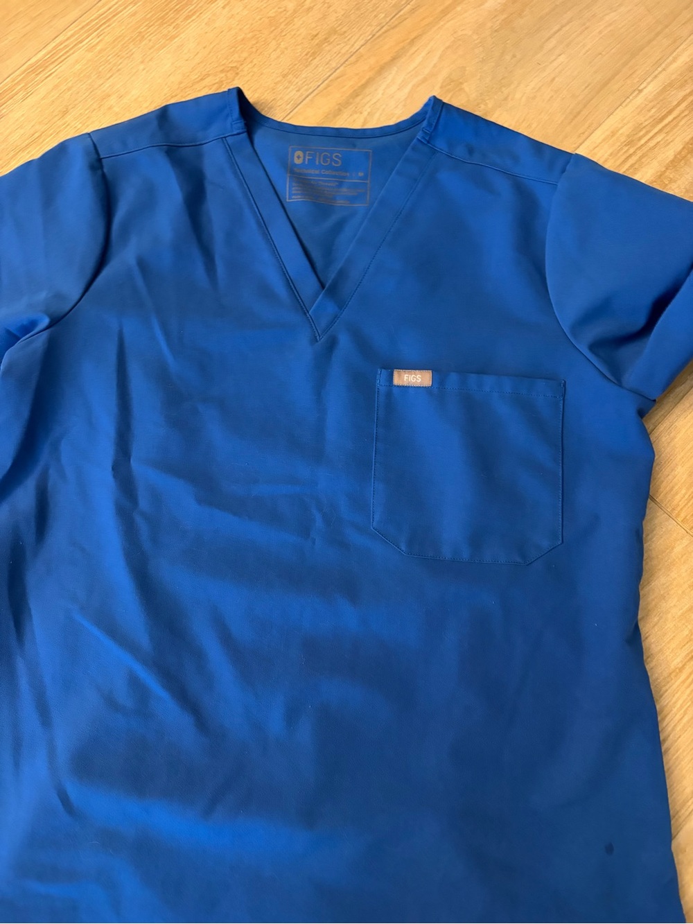 FIGS Women's Scrub Top in Royal Blue